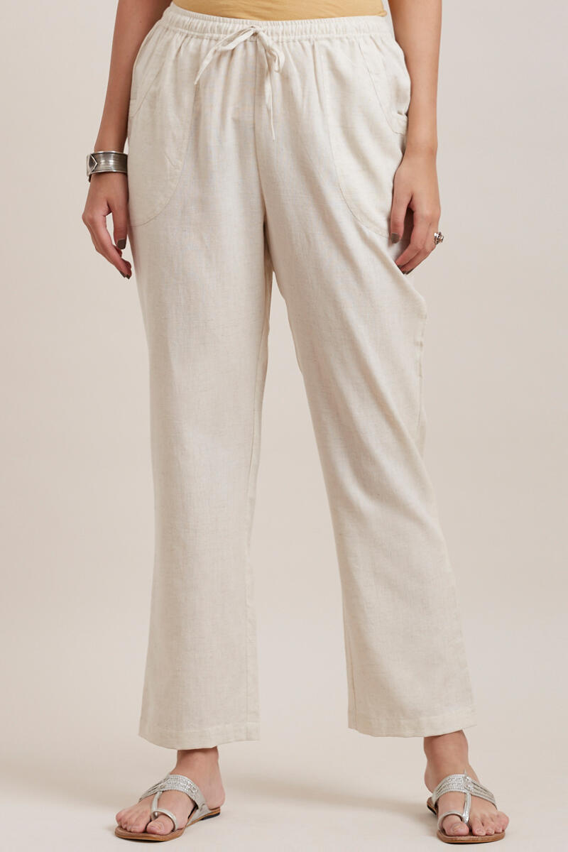 OffWhite White Formal Pants  Dua Lipas Trousers Have 2 Circle Cutouts  That Are Placed in Interesting Spots  POPSUGAR Fashion Photo 7